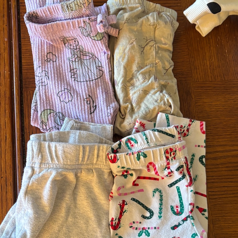 7 item arrangement, 9mo jackets pant, four 12 mo pants